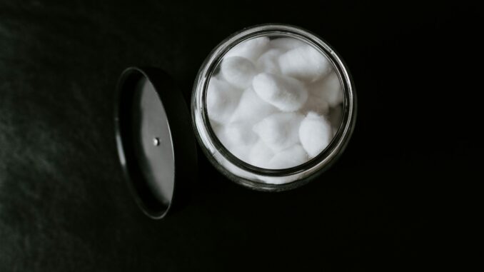 Making cosmetics sustainable with generative AI Container with cotton balls illustrating an AI partnership between L’Oréal and IBM to use foundation models to improve sustainability and innovation in the beauty and cosmetics industry.